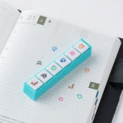 Hobonichi 2026 Accessories: Tamagotchi - Pochitto6 Push-Button Stamp