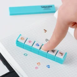 Hobonichi 2026 Accessories: Tamagotchi - Pochitto6 Push-Button Stamp